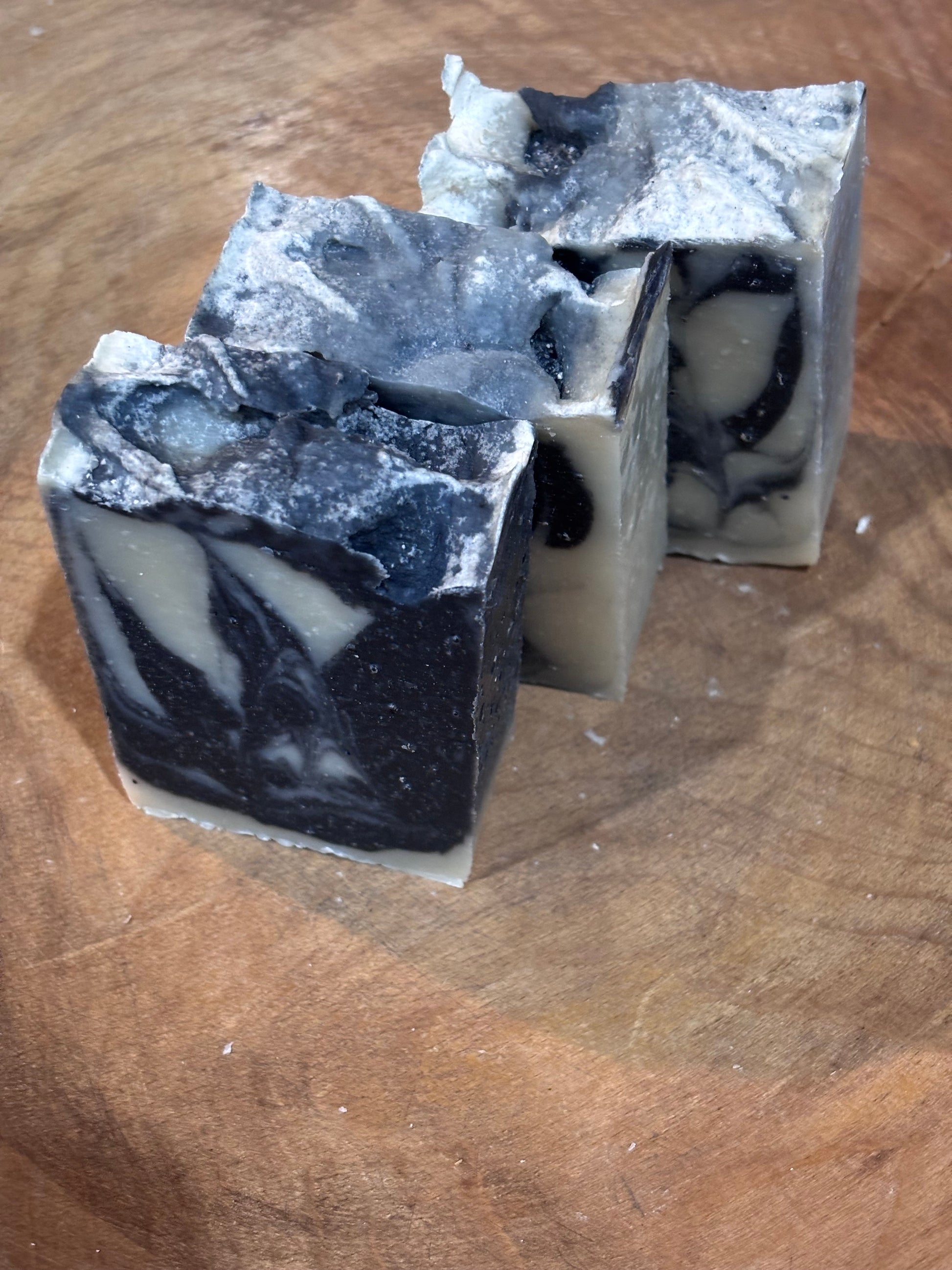 3 bars of black and white bay rum soap. Ingredients include saponified oils of olive, palm, coconut and castor; Bay Rum fragrance, poppyseeds for gentle exfoliation