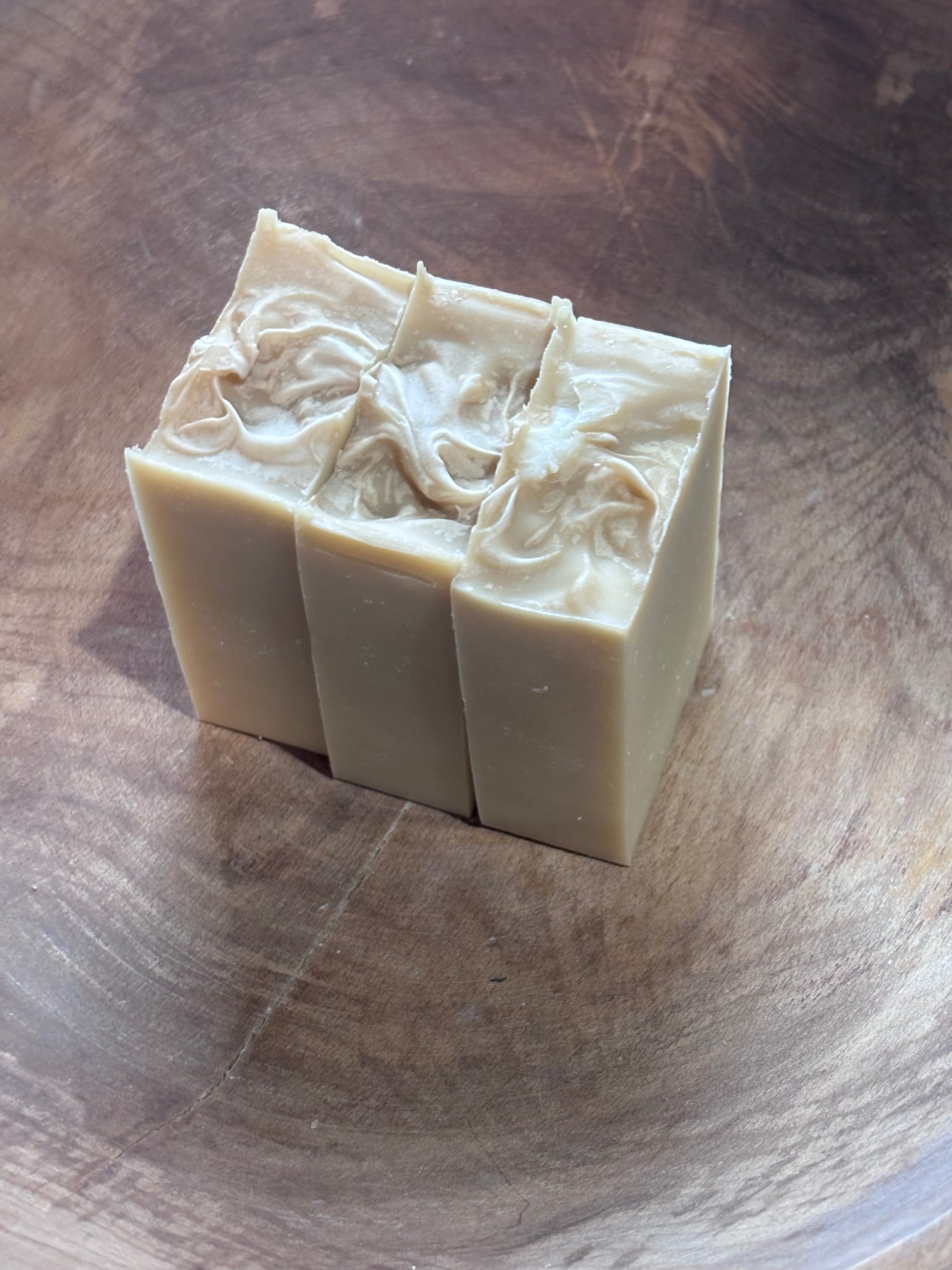 Nag Champa. Three bars of tan colored soap sitting in a wooden bowl. Ingredients: distilled water; saponified oils of olive, palm, coconut, castor; fragrance oil

Smells like incense or your favorite hippy from the 60s! 