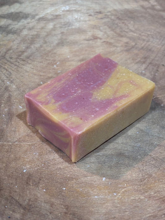 Smells a bit like fresh, mountain air first thing in the morning and cranberries with a slight hint of cinnamon. Ingredients include saponified oils of olive, coconut, palm, castor, cocoa butter and avocado oil, fragrance oil, rose clay and yellow brazilian clay